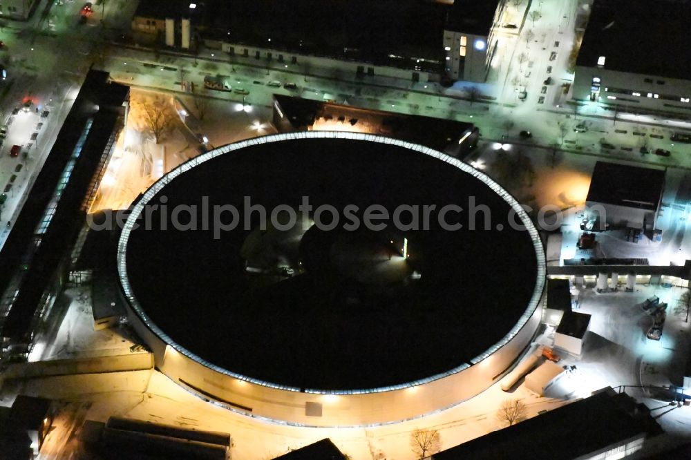 Berlin at night from the bird perspective: Night lighting The electron storage ring BESSY - the third generation synchrotron radiation source in Berlin - Adlershof