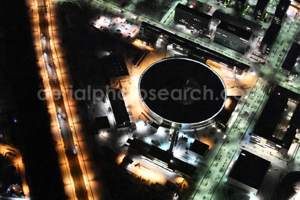 Berlin at night from above - Night lighting The electron storage ring BESSY - the third generation synchrotron radiation source in Berlin - Adlershof