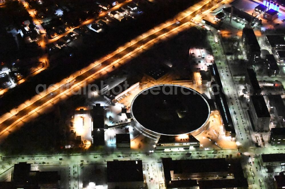 Aerial photograph at night Berlin - Night lighting The electron storage ring BESSY - the third generation synchrotron radiation source in Berlin - Adlershof