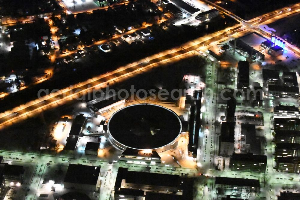 Aerial image at night Berlin - Night lighting The electron storage ring BESSY - the third generation synchrotron radiation source in Berlin - Adlershof