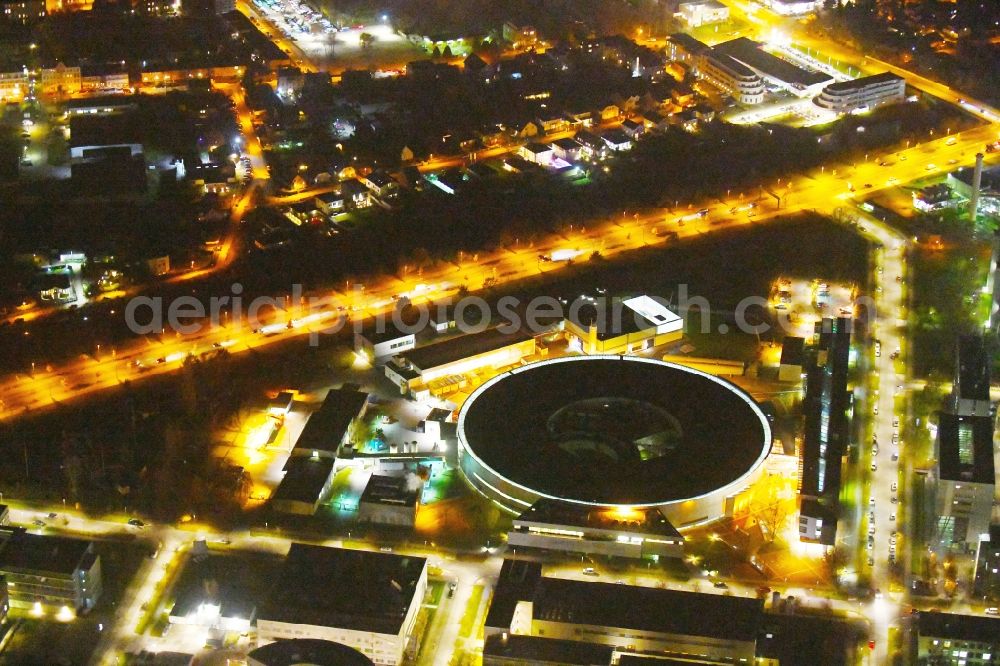 Aerial photograph at night Berlin - Night lighting The electron storage ring BESSY - the third generation synchrotron radiation source in Berlin - Adlershof