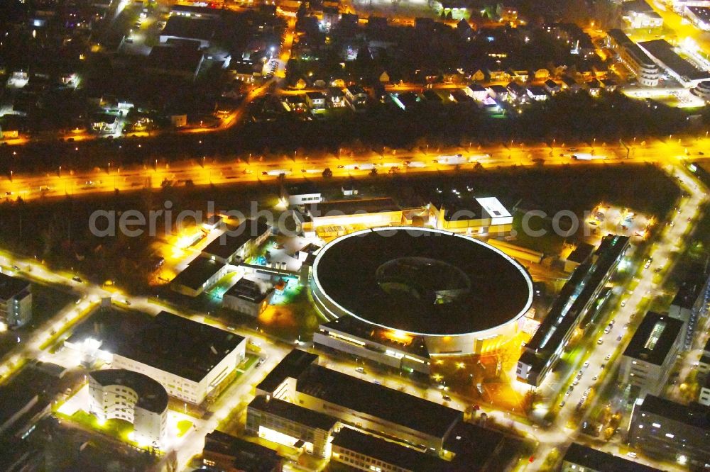 Aerial image at night Berlin - Night lighting The electron storage ring BESSY - the third generation synchrotron radiation source in Berlin - Adlershof