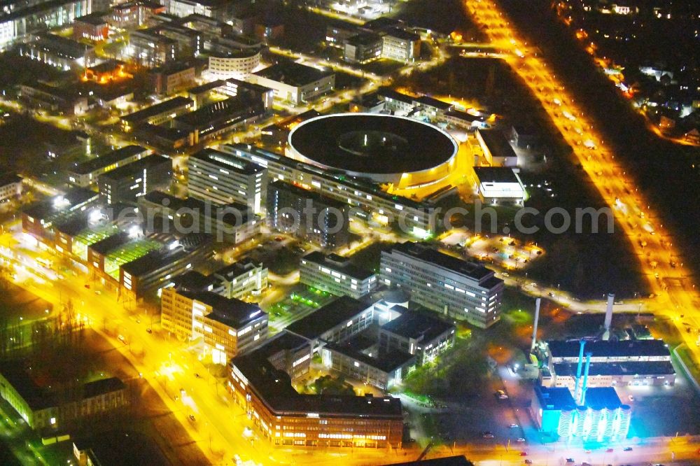 Berlin at night from the bird perspective: Night lighting The electron storage ring BESSY - the third generation synchrotron radiation source in Berlin - Adlershof