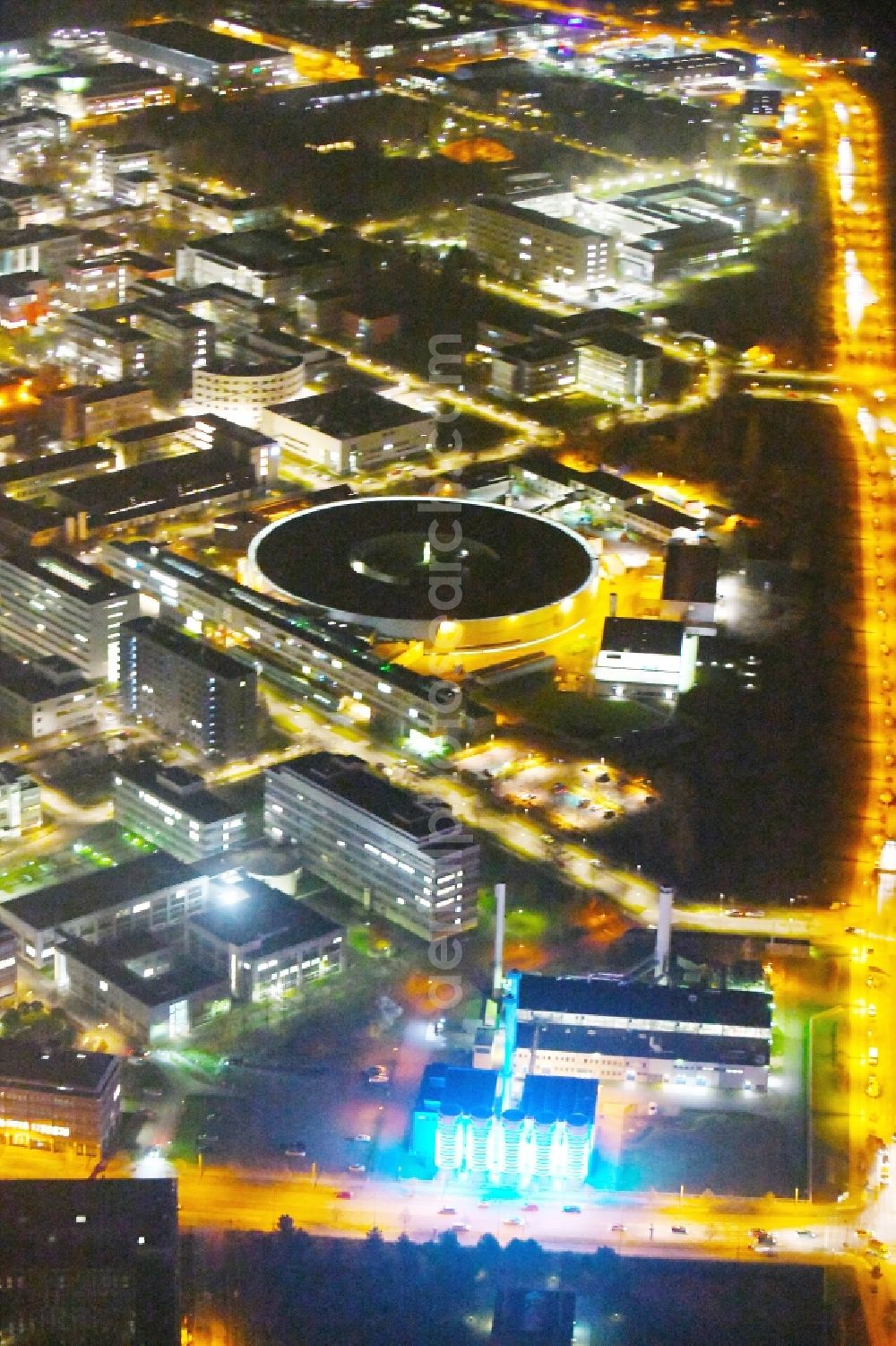 Aerial image at night Berlin - Night lighting The electron storage ring BESSY - the third generation synchrotron radiation source in Berlin - Adlershof