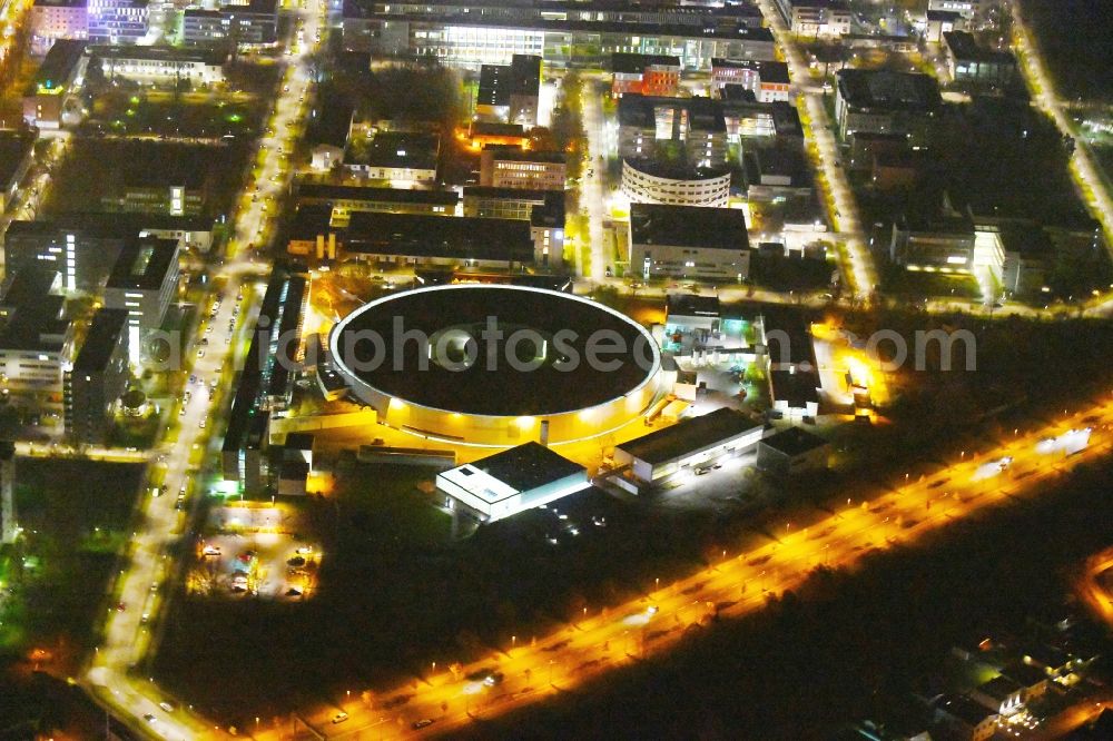 Berlin at night from above - Night lighting The electron storage ring BESSY - the third generation synchrotron radiation source in Berlin - Adlershof