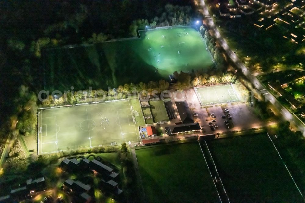 Odense at night from above - Night lighting ensemble of sports grounds in the district Odense NOe in Odense in Syddanmark, Denmark