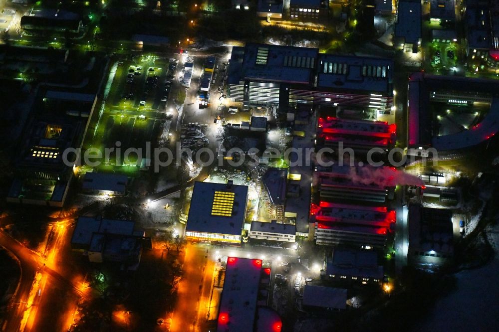 Aerial image at night Lübeck - Night lighting construction site for a new extension to the hospital grounds UKSH Universitaetsklinikum Schleswig-Holstein in the district St. Juergen in Luebeck in the state Schleswig-Holstein, Germany