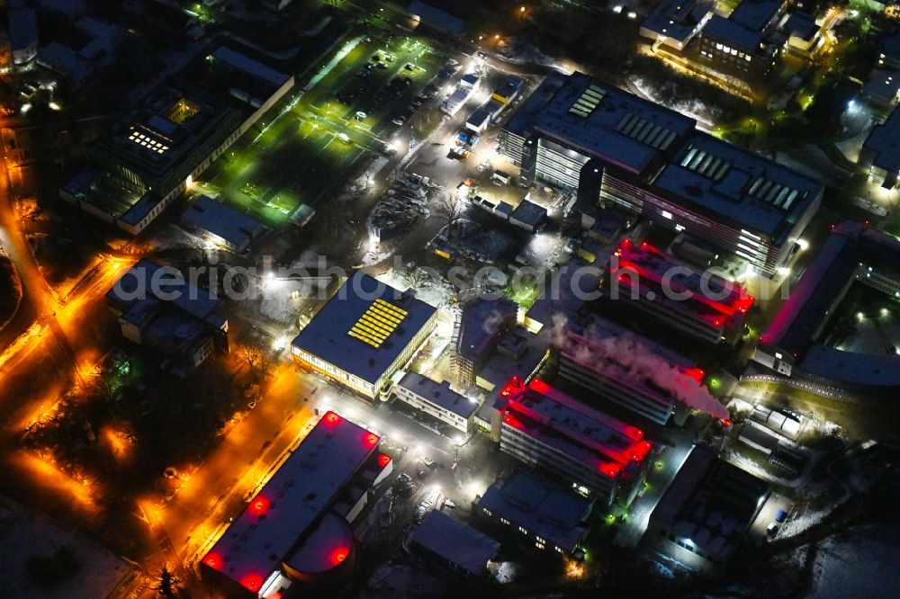 Lübeck at night from above - Night lighting construction site for a new extension to the hospital grounds UKSH Universitaetsklinikum Schleswig-Holstein in the district St. Juergen in Luebeck in the state Schleswig-Holstein, Germany