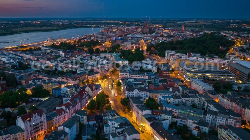 Rostock at night from the bird perspective: Night lighting half-timbered house and multi-family house- residential area in the old town area and inner city center on Doberaner Platz in Rostock at the baltic sea coast in the state Mecklenburg - Western Pomerania, Germany