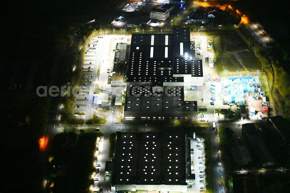 Deubachshof at night from above - Night lighting buildings and production halls on the vehicle construction site BMW Fahrzeugtechnik GmbH on street Stedtfelder Strasse in Deubachshof in the state Thuringia, Germany