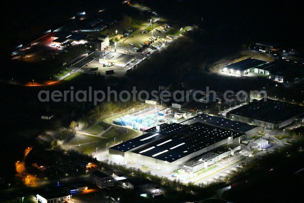 Deubachshof at night from above - Night lighting buildings and production halls on the vehicle construction site BMW Fahrzeugtechnik GmbH on street Stedtfelder Strasse in Deubachshof in the state Thuringia, Germany