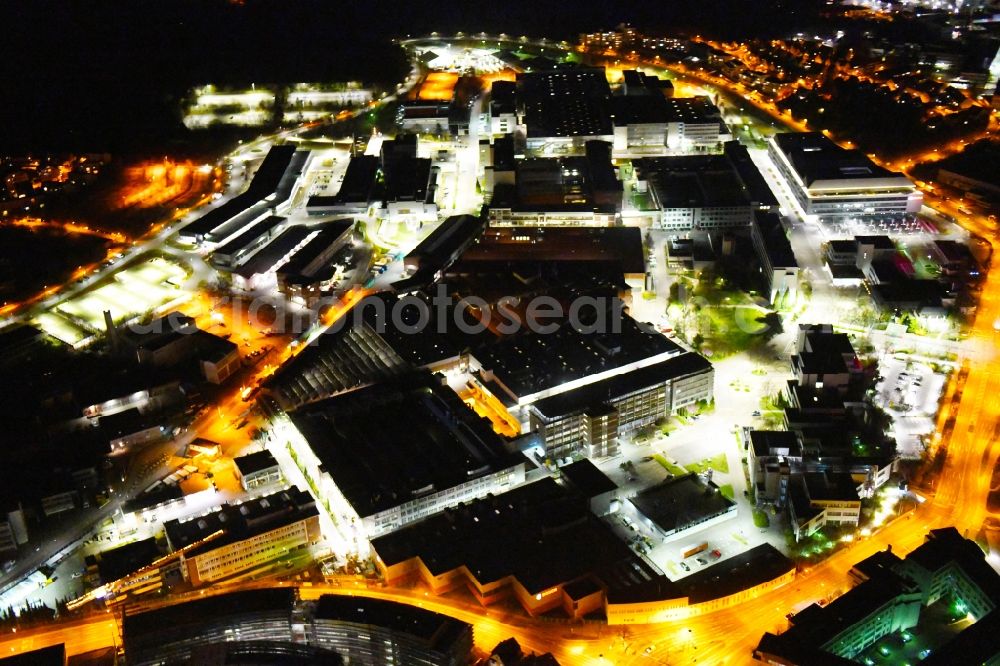 Aerial photograph at night Stuttgart - Night lighting buildings and production halls on the vehicle construction site of Robert Bosch GmbH Feuerbach on Wernerstrasse in the district Siegelberg in Stuttgart in the state Baden-Wurttemberg, Germany