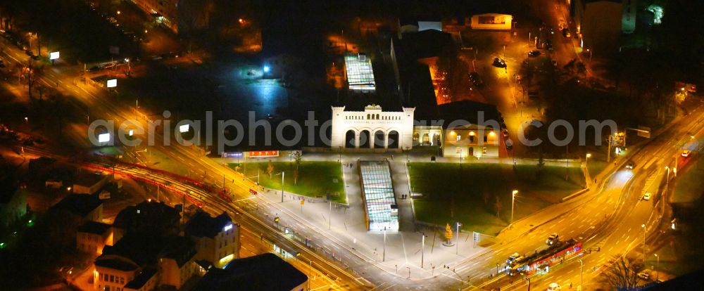 Aerial image at night Leipzig - Night lighting facade of the monument Saechsisch-Bayerischer Bahnhof on place Bayrischer Platz in the district Zentrum-Suedost in Leipzig in the state Saxony, Germany