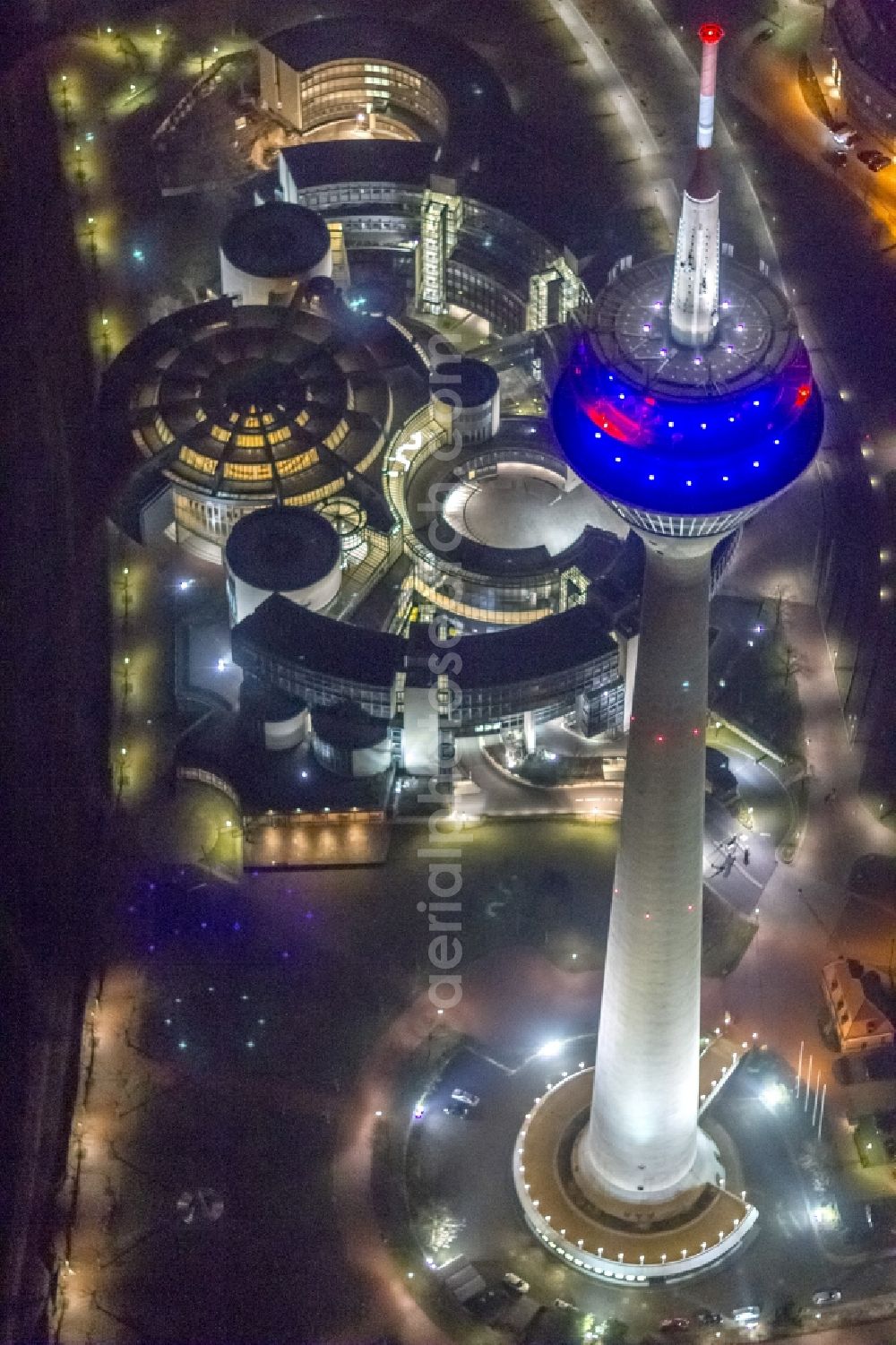 Aerial photograph at night Düsseldorf - Night lighting Television Tower Rheinturm on Stromstrasse in Duesseldorf in the state North Rhine-Westphalia, Germany