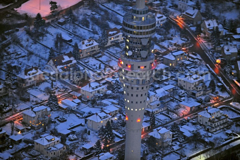 Dresden at night from above - Nachtluftbild vom Dresdner Fernsehturm und den winterlich verschneiten Stadtteil Wachwitz mit schneebedeckten Dächern. View of the Dresden TV tower and thewintery area Wachwitz with snow-covered roofs.