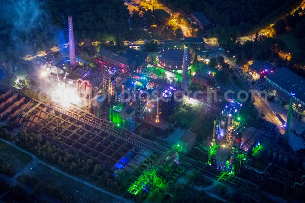 Duisburg at night from the bird perspective: Fireworks in the landscape park Duisburg-Nord in the Night of Industrial Culture in Action extra layer 2012