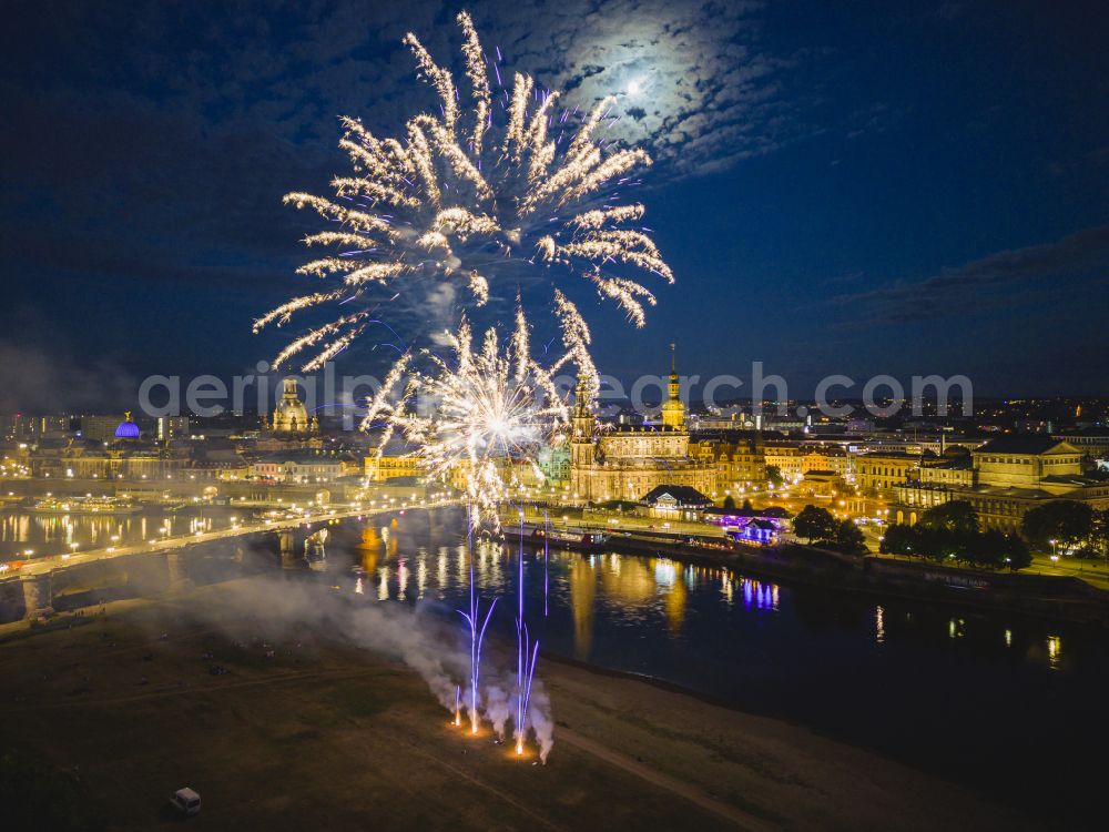 Aerial photograph at night Dresden - Fireworks figures in the night sky above the event grounds of Elbwiesen on street Koenigsufer in the district Altstadt in Dresden in the state Saxony, Germany