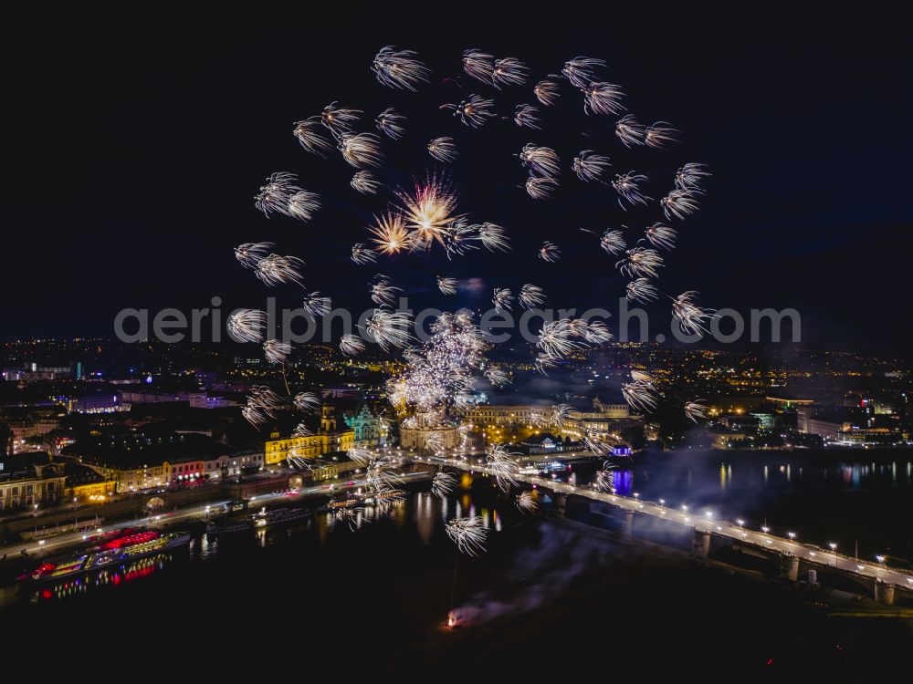 Aerial image at night Dresden - Fireworks figures in the night sky above the event grounds of Elbwiesen on street Koenigsufer in the district Altstadt in Dresden in the state Saxony, Germany