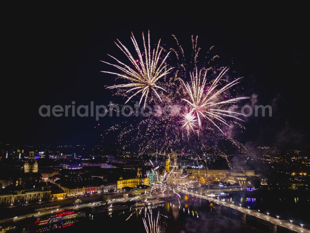 Aerial photograph at night Dresden - Fireworks figures in the night sky above the event grounds of Elbwiesen on street Koenigsufer in the district Altstadt in Dresden in the state Saxony, Germany