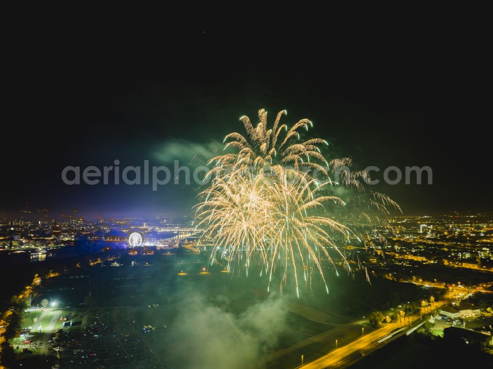 Aerial photograph at night Dresden - Night lighting fireworks figures in the night sky above the event grounds Pyrogames on street Messering in the district Friedrichstadt in Dresden in the state Saxony, Germany