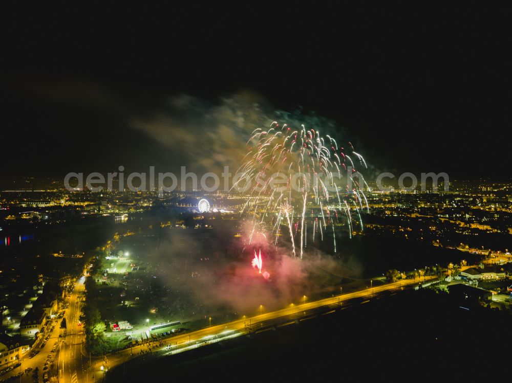 Dresden at night from above - Night lighting fireworks figures in the night sky above the event grounds Pyrogames on street Messering in the district Friedrichstadt in Dresden in the state Saxony, Germany