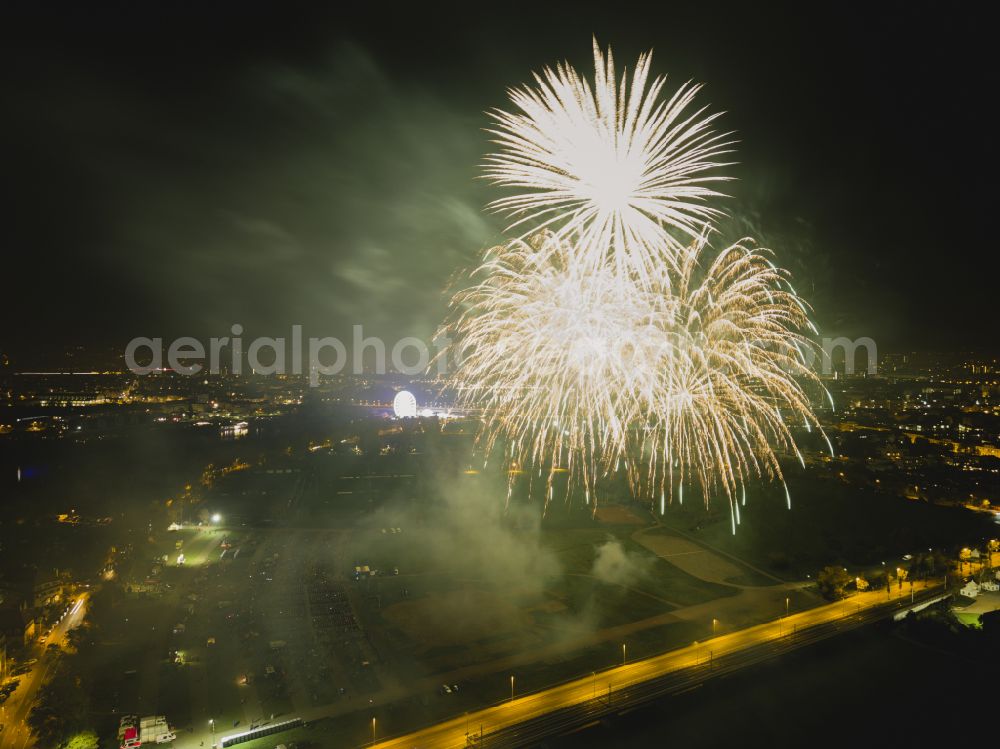 Dresden at night from the bird perspective: Night lighting fireworks figures in the night sky above the event grounds Pyrogames on street Messering in the district Friedrichstadt in Dresden in the state Saxony, Germany