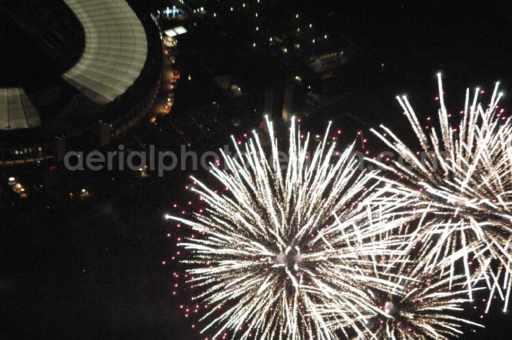 Aerial photograph at night Berlin - Fireworks figures in the night sky above the event grounds Pyronale on Maifeld in the district Charlottenburg-Wilmersdorf in Berlin, Germany