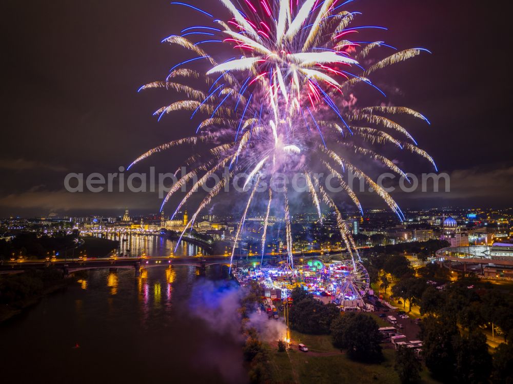 Dresden at night from above - Night lighting fireworks figures in the night sky above the event grounds of Volksfestgelaende on street Pieschener Allee in the district Friedrichstadt in Dresden in the state Saxony, Germany