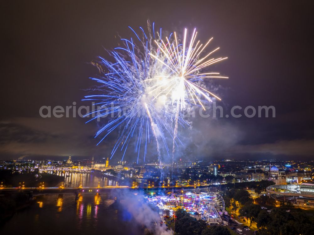 Dresden at night from above - Night lighting fireworks figures in the night sky above the event grounds of Volksfestgelaende on street Pieschener Allee in the district Friedrichstadt in Dresden in the state Saxony, Germany