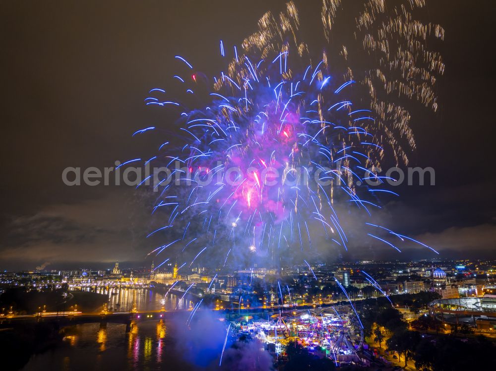 Aerial photograph at night Dresden - Night lighting fireworks figures in the night sky above the event grounds of Volksfestgelaende on street Pieschener Allee in the district Friedrichstadt in Dresden in the state Saxony, Germany