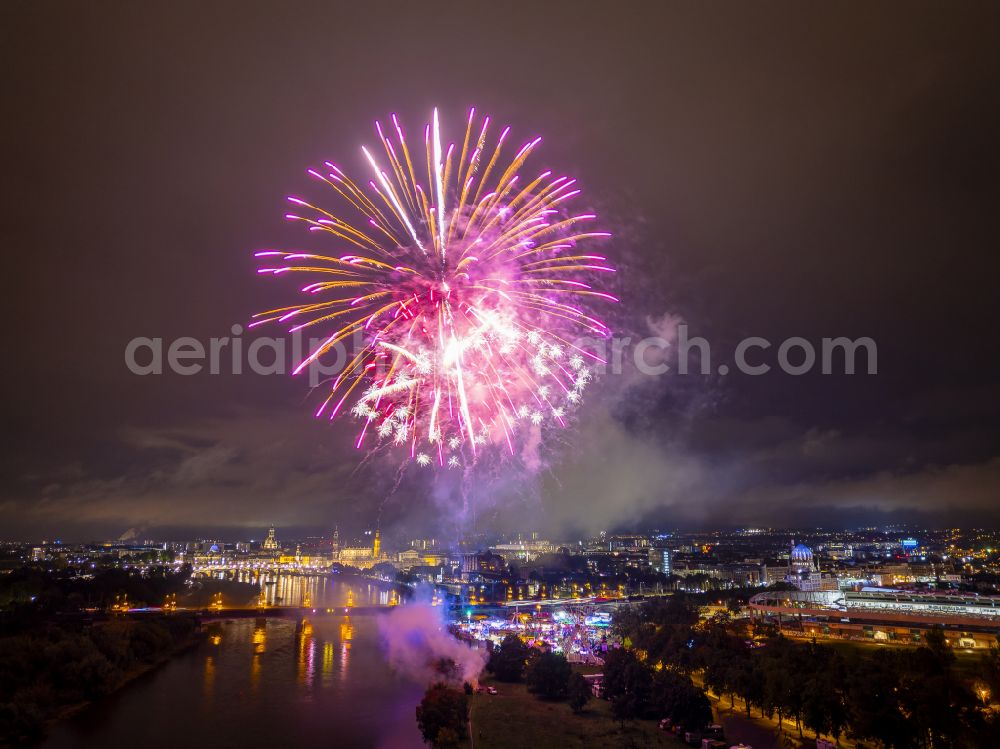 Dresden at night from above - Night lighting fireworks figures in the night sky above the event grounds of Volksfestgelaende on street Pieschener Allee in the district Friedrichstadt in Dresden in the state Saxony, Germany