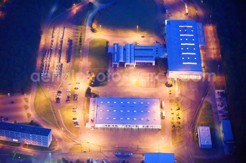 Schwerin at night from above - Night lighting Company grounds and facilities of Nahverkehr Schwerin GmbH in of Ludwigsluster Chaussee in Schwerin in the state Mecklenburg - Western Pomerania, Germany