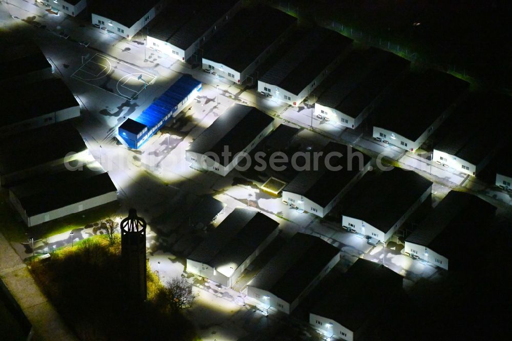 Leipzig at night from above - Night lighting Container settlement as temporary shelter and reception center for refugees Graf-Zeppelin-Ring - Am alten Flughafen in the district Nordost in Leipzig in the state Saxony, Germany