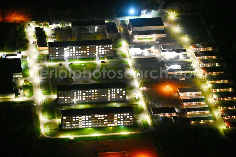 Aerial photograph at night Halberstadt - Night lighting refugee - buildings Zentrale Anlaufstelle fuer Asylbewerber on Friedrich-List-Strasse in Halberstadt in the state Saxony-Anhalt