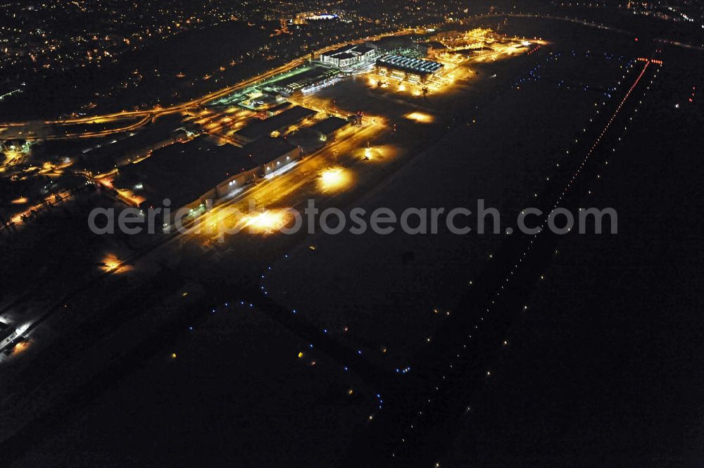 Aerial image at night Dresden - Nachtaufnahme des internationalen Flughafens Dresden (IATA Code DRS). Der Flughafen liegt im äußersten Norden der Stadt Dresden, im Stadtteil Klotzsche. Night view of the international airport Dresden DRS.