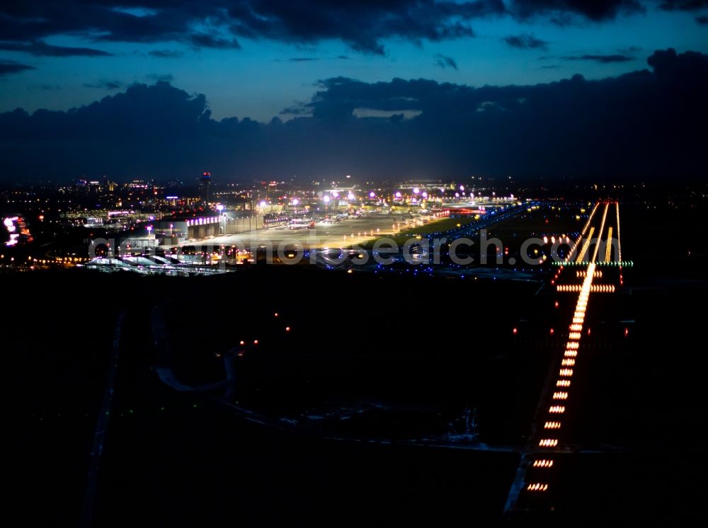 Düsseldorf at night from above - Night lighting airport runways in Duesseldorf in the state North Rhine-Westphalia, Germany