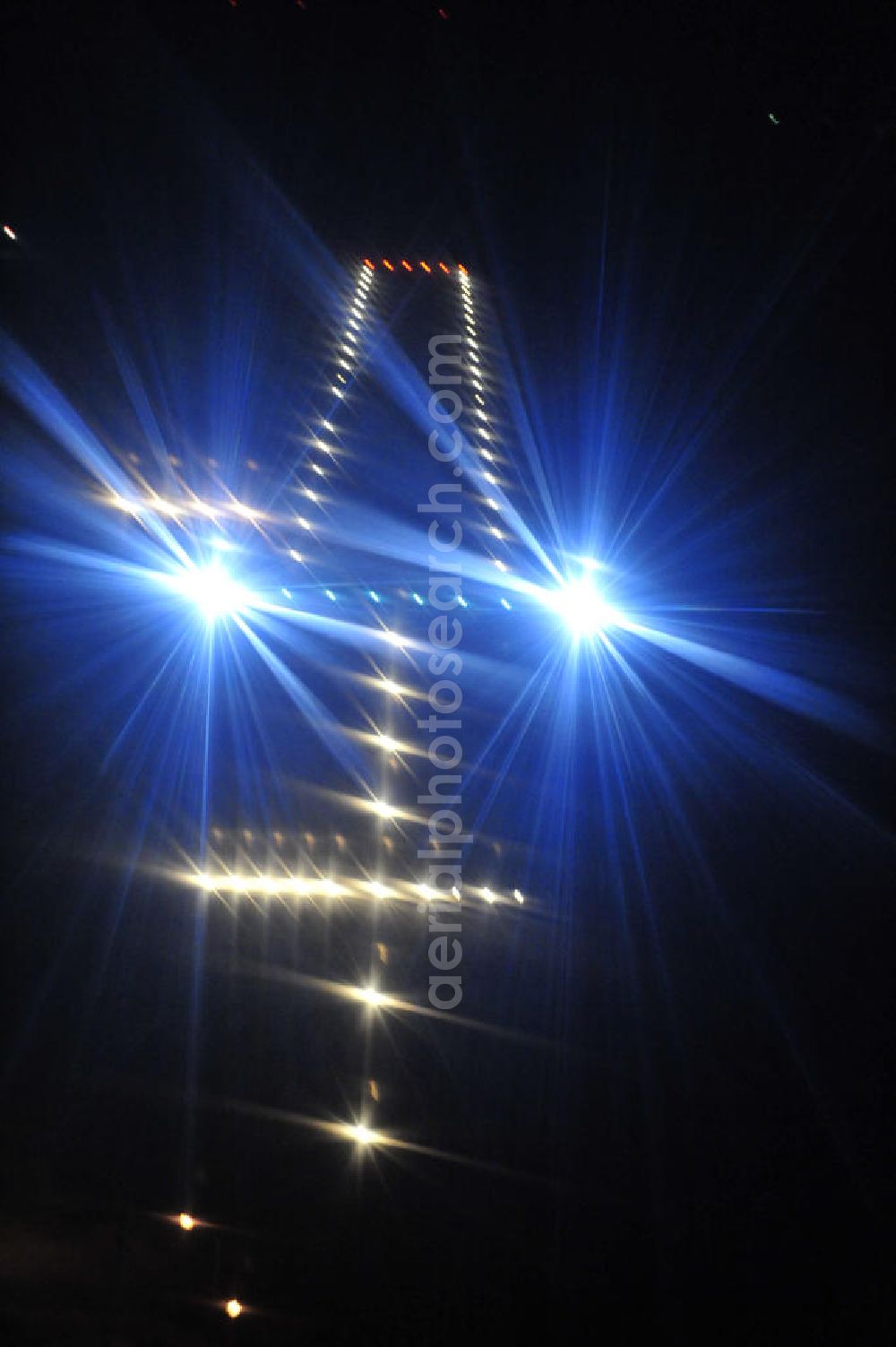 Aerial image at night Strausberg - Nachtaufnahme: Beleuchtung / Befeuerung der Landebahn am Flugplatz Strausberg EDAY. Night Shot: Lighting / beacomimg of the runway at the airfield Strausberg.