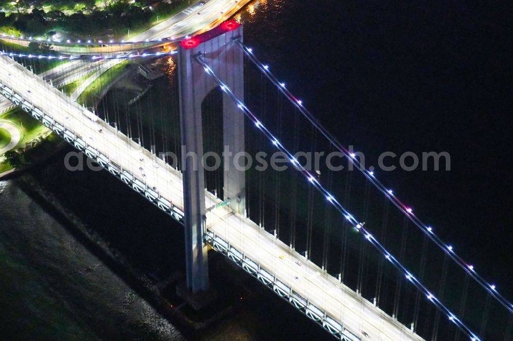 New York at night from above - Night lighting River - bridge construction Verrazano-Narrows Bridge Staten Island in New York in United States of America