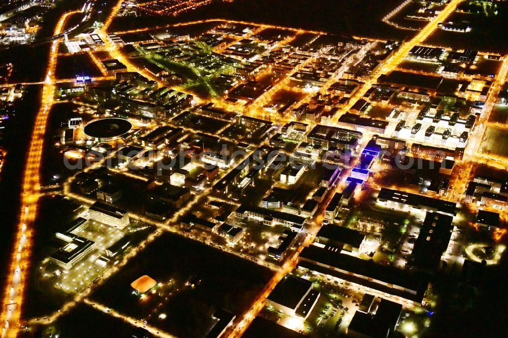 Berlin at night from the bird perspective: Night lighting research building and office complex Elektronen- Speicherring BESSY - Synchrotronstrahlungsquelle in the district Adlershof in Berlin, Germany