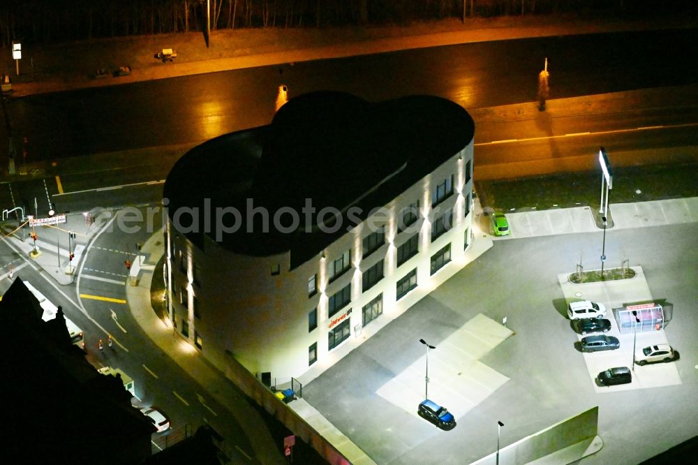 Aerial image at night Gotha - Night lighting leisure Centre - Amusement Park clever fit on street Stielerstrasse in Gotha in the state Thuringia, Germany