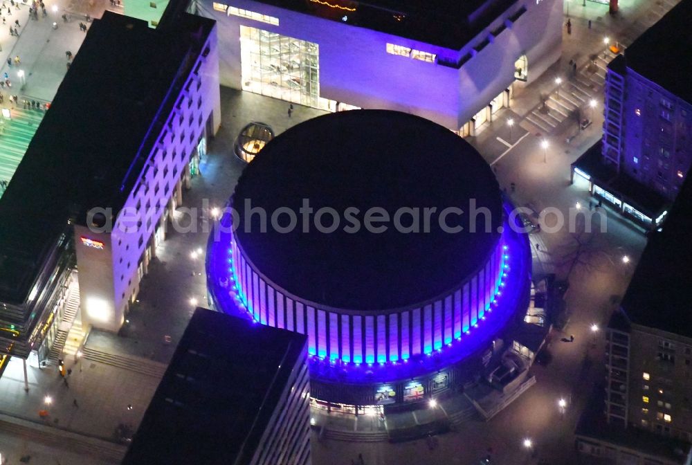 Aerial photograph at night Dresden - Night lights and lighting Building of the round cinema - Rundkino Dresden. The rotunda is located on the Prager Strasse in the district Altstadt in Dresden in the federal state of Saxony, Germany