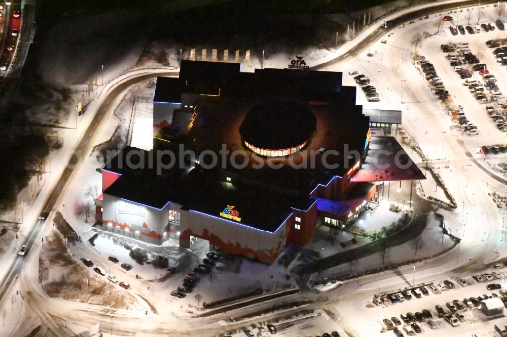 Aerial image at night Wildau - Night view wintry snowy Building of the cinema - movie theater A10 Freizeitwelt und CineStar Cinemain Wildau in the state Brandenburg