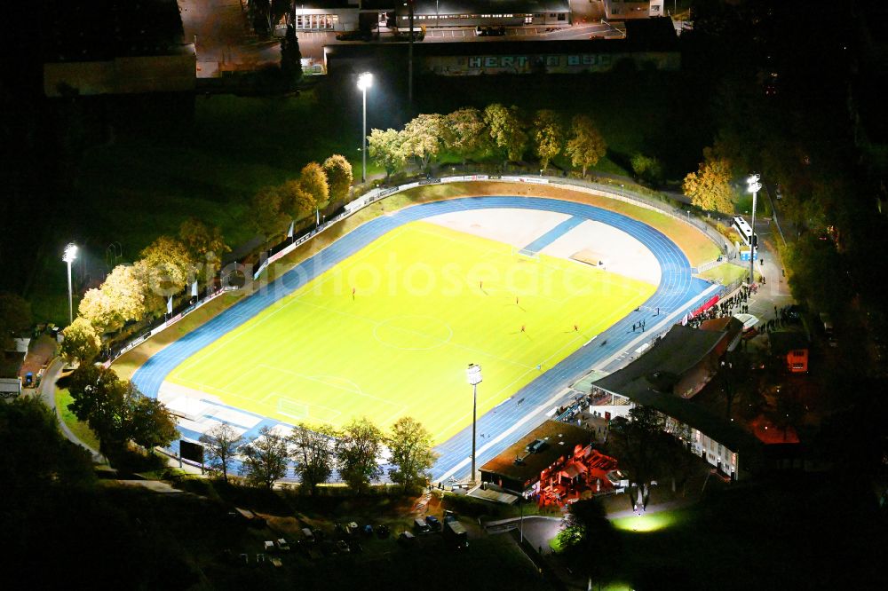 Berlin at night from above - Night lighting football stadium of the football club SSC Sport-Club Charlottenburg e.V. in the district Charlottenburg in Berlin, Germany