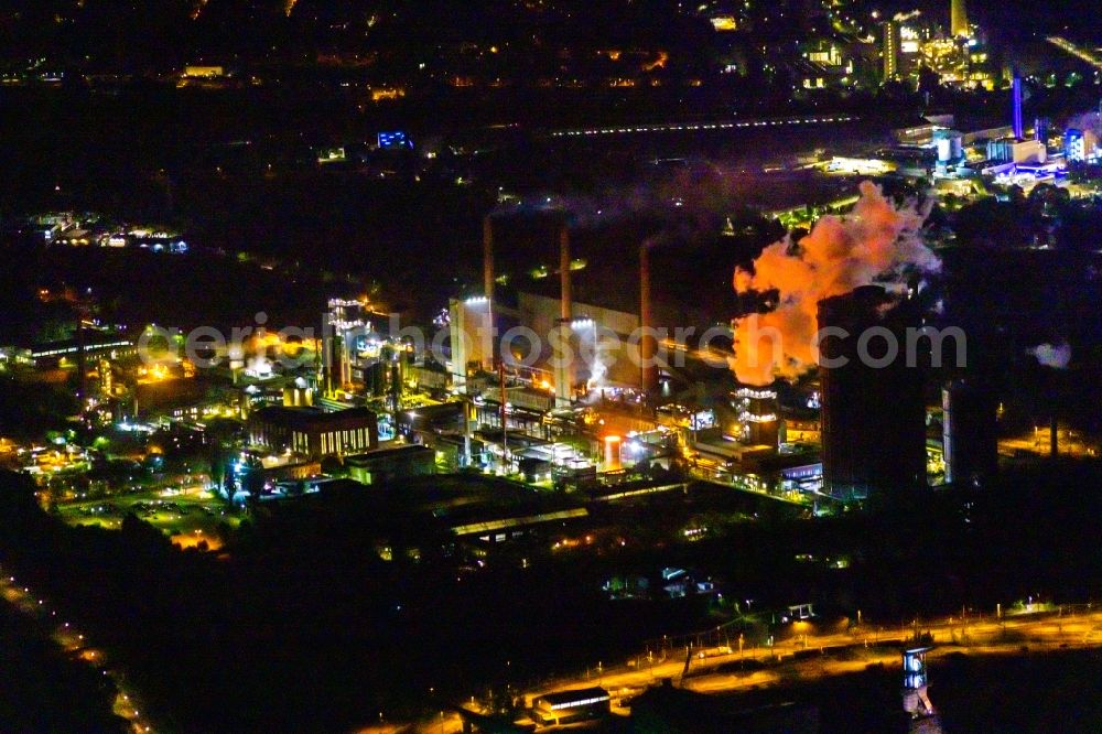 Bottrop at night from above - Night lighting gasometer high storage tank at Kokerei Prosper in Bottrop at Ruhrgebiet in the state North Rhine-Westphalia