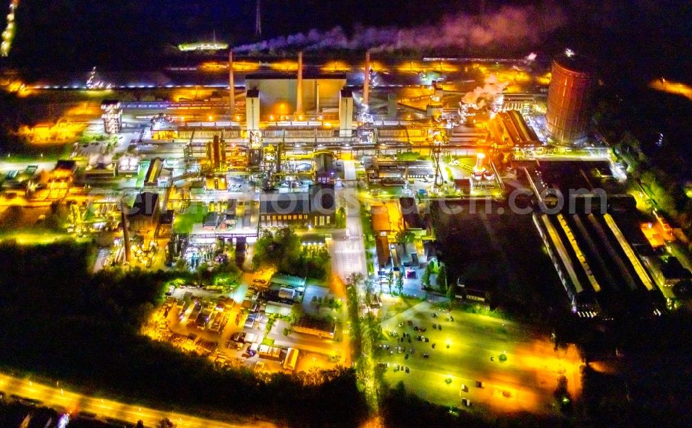 Bottrop at night from above - Night lighting gasometer high storage tank at Kokerei Prosper in Bottrop at Ruhrgebiet in the state North Rhine-Westphalia