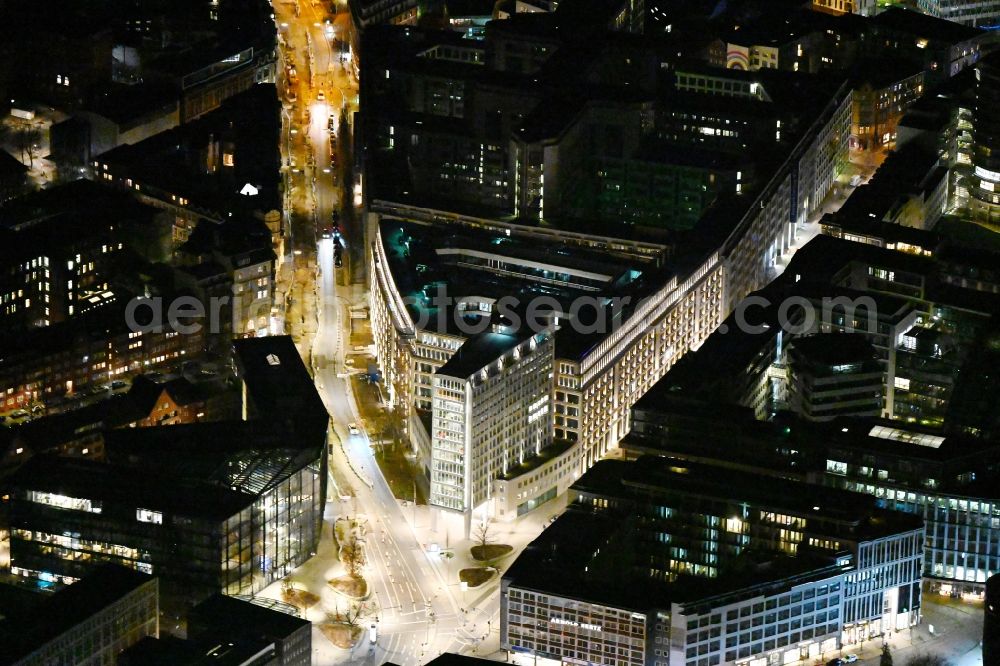 Aerial image at night Hamburg - Night lighting office and corporate management high-rise building of Axel Springer SE on Axel-Springer-Platz in the district Neustadt in Hamburg, Germany