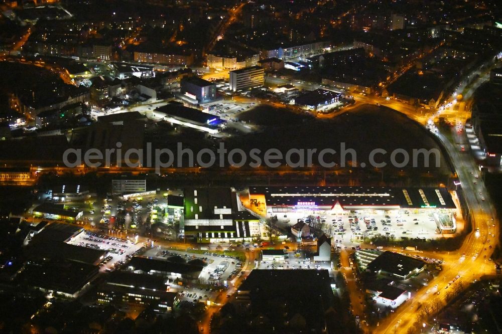 Aerial photograph at night Nürnberg - Night lighting Building of the construction market Bauhaus on Geisseestrasse in the district Sankt Leonhard in Nuremberg in the state Bavaria, Germany