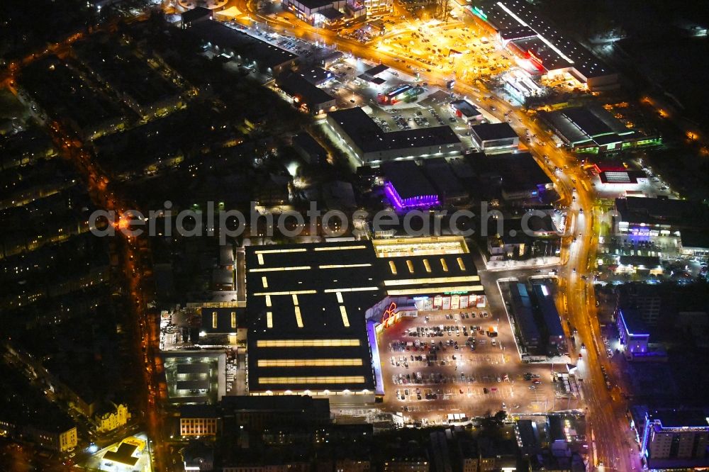 Lübeck at night from above - Night lighting building of the construction market BAUHAUS Luebeck Bei of Lohmuehle in Luebeck in the state Schleswig-Holstein, Germany