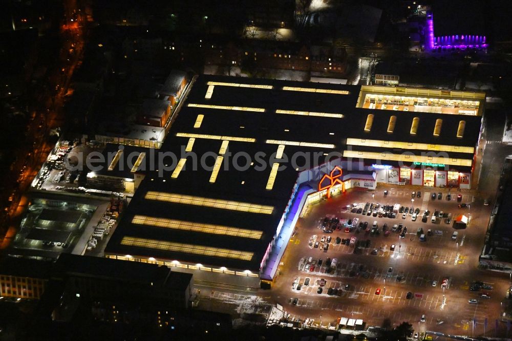 Lübeck at night from above - Night lighting building of the construction market BAUHAUS Luebeck Bei of Lohmuehle in Luebeck in the state Schleswig-Holstein, Germany