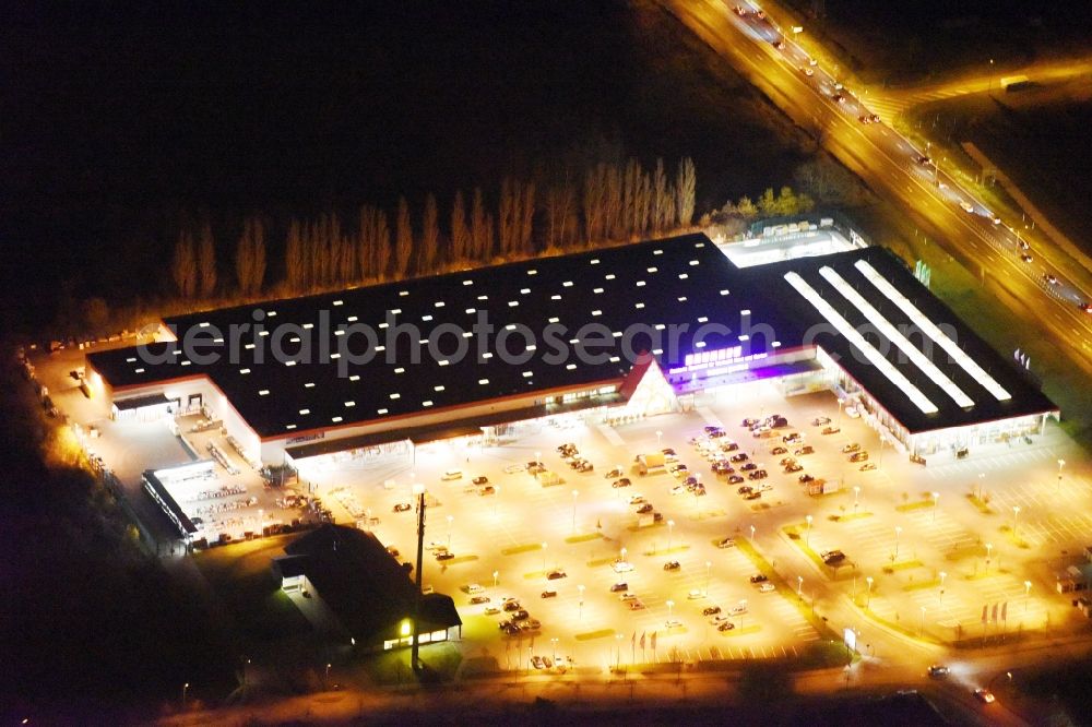 Aerial photograph at night Rostock - Night view building of the construction market BAUHAUS Rostock-Schutow in the district Evershagen in Rostock in the state Mecklenburg - Western Pomerania